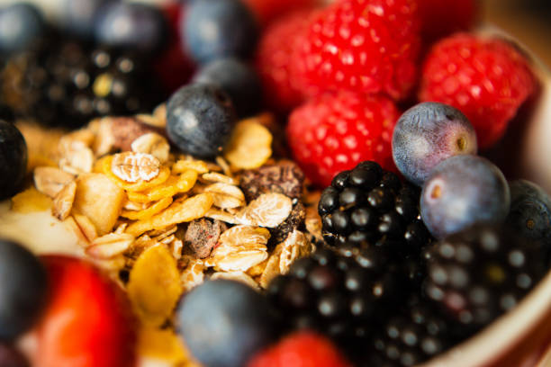 istock Healthy breakfast concept with oat flakes and berries 956954302