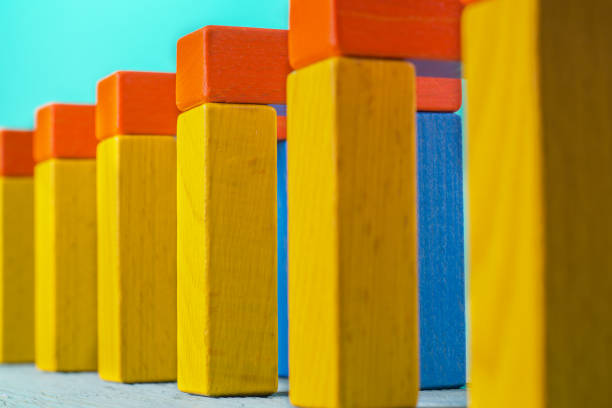 istock Geometric shapes on a wooden background. 956963184