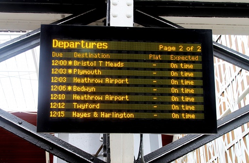 Train departure board in Paddington station London
