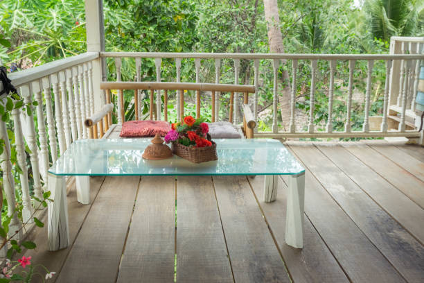 istock Thai-style seating on balcony in garden house 956968202