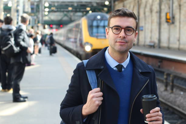 istock Elegant man about to catch a train 956969758
