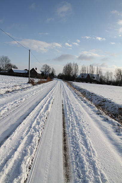 istock snow on the country road 95697430