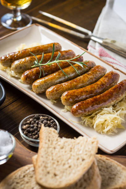 istock Homemade Pork Sausages with Cabbage, Mustard and Beer 956981028