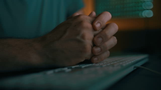 Nervous hands and computer keyboard