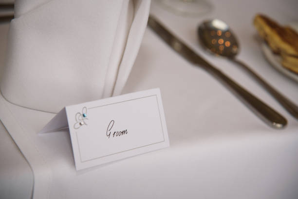 istock Groom Name card on Wedding Top Table 956981816