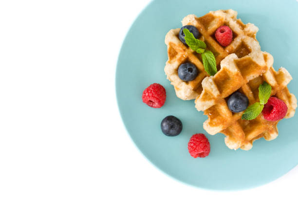 istock Traditional belgian waffles with blueberries and raspberries 956981926