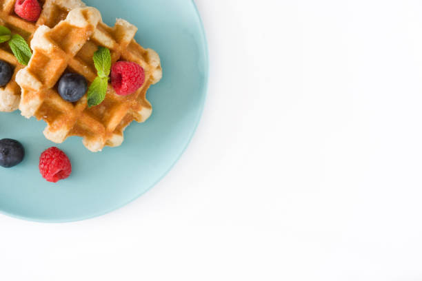 istock Traditional belgian waffles with blueberries and raspberries 956982190