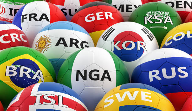 soccer balls colored in different national flag colors - 3D rendering