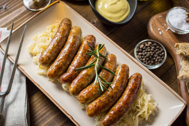 istock Homemade Pork Sausages with Cabbage, Mustard and Beer 956985326