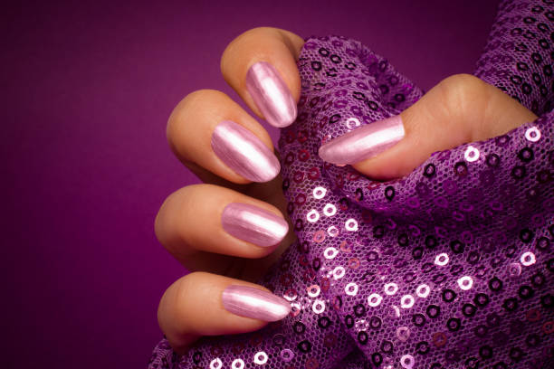 istock shiny purple nails manicure 956988910