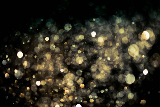 istock Christmas blur bokeh background texture abstract light glittering stars on bokeh. glitter vintage lights background 956989940