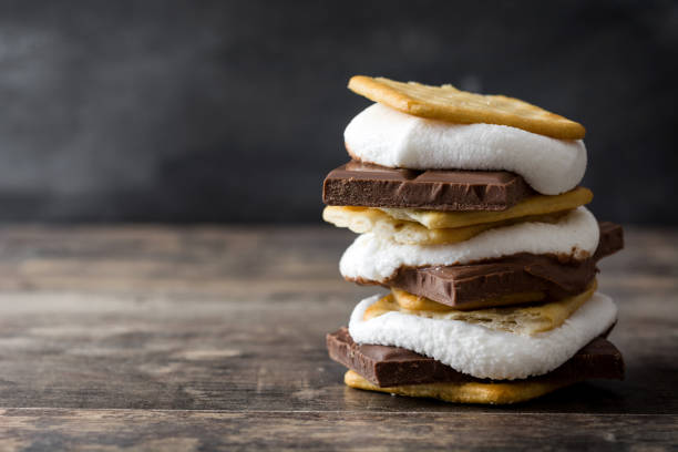 Homemade smores Homemade smores on wooden table. Copyspace smore photos stock pictures, royalty-free photos & images