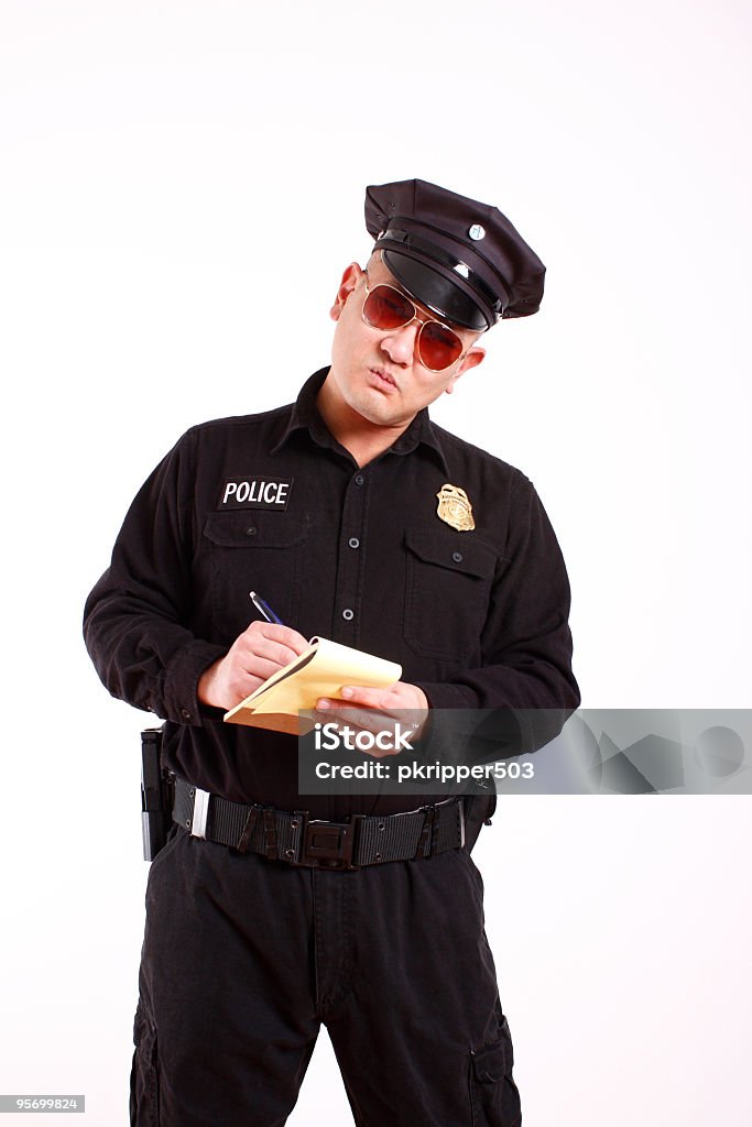 Police Officer Writing A Citation Stock Photo Download Image Now police-officer-writing-a-citation-stock-photo-download-image-now