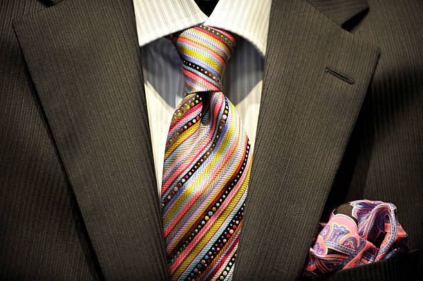 business-anzug krawatte und paisley-flips. - brown necktie red gold stock-fotos und bilder