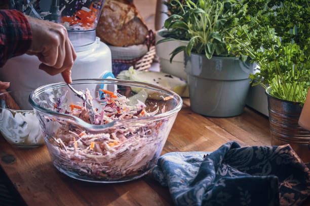 Preparing Cole Slaw Salad in Domestic Kitchen