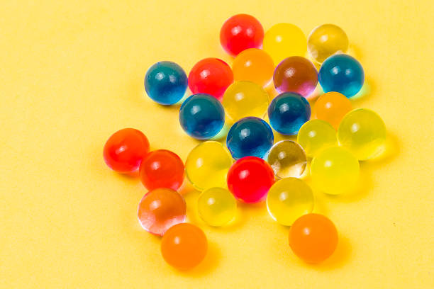istock Background made with scattered color gel balls 957006410