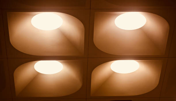 istock Stylish interior ceiling lights isolated background photo 957016448