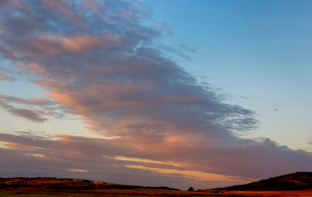 istock Sunset against a background of blue clouds 957017492