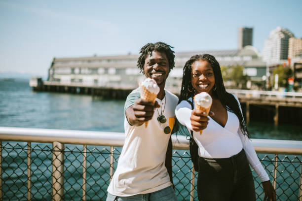 istock Couple Enjoying Ice Cream on Seattle Pier 957019858