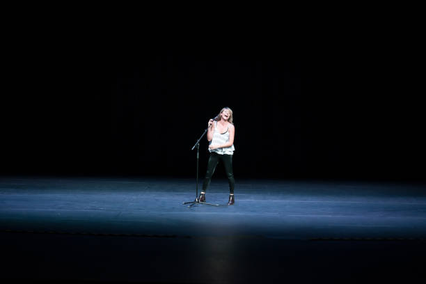 istock Latin american beautiful singing performer on stage 957023774