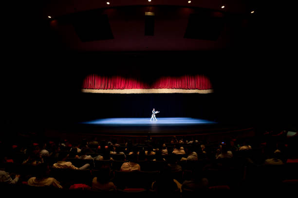 istock Ballet dancers on a stage performance at a theater 957023802