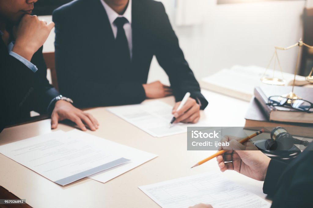 Lawyer and attorney having team meeting at law firm. Law, advice and Legal services concept. Lawyer and attorney having team meeting at law firm. Government Stock Photo
