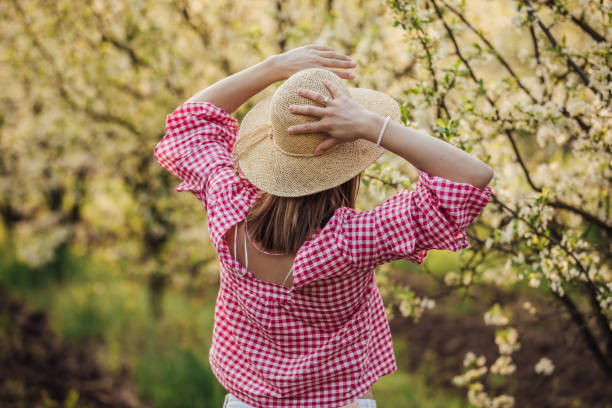 istock Girl in orchard 957027896