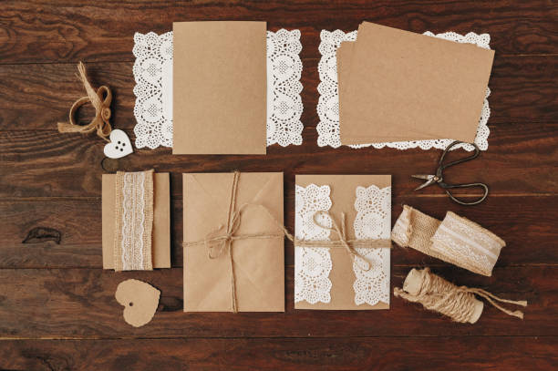istock How to make Wedding Invitation. Rustic Diy concept. Handmade handcrafted items Flat lay 957028144