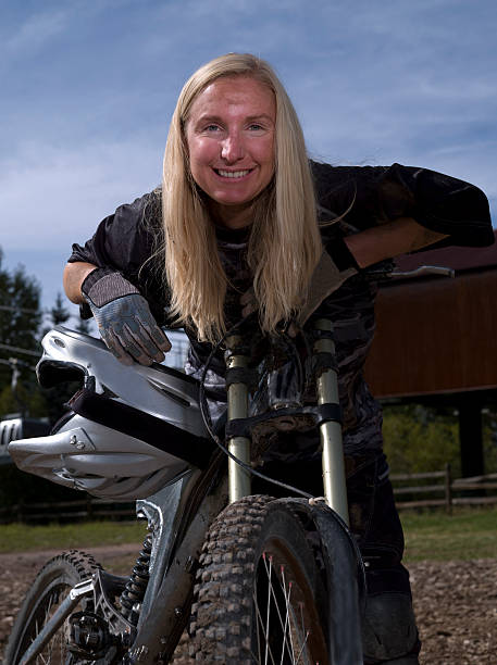 istock Female downhill mountain biker posing for a picture 95703194