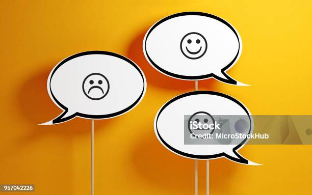 White Chat Bubble With Wooden Stick On Yellow Background Stock Photo - Download Image Now