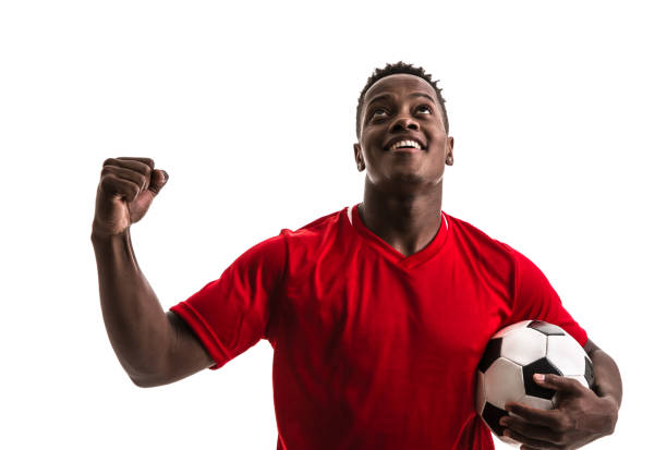istock Fan / Sport Player on red uniform celebrating on white background 957043130