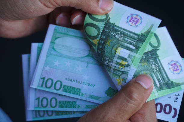 istock Counting money euro  - Businessman 957046656