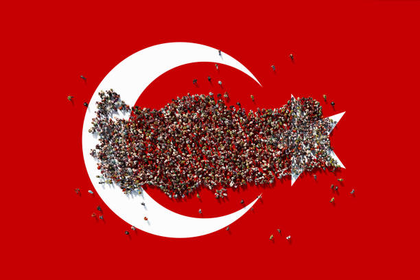 Human crowd forming a big Turkey map on Turkish flag background. Horizontal composition with copy space. Patriotism concept.