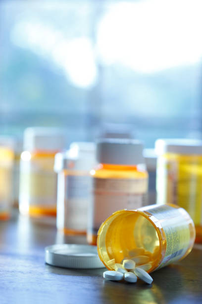 istock Open Prescription Medication Bottle On Countertop 957050526