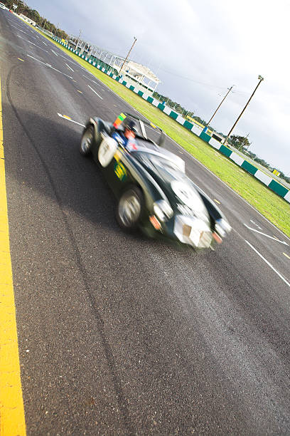 istock Speeding racer on racetrack 95705076
