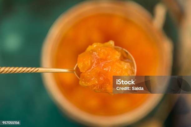 Orange Jam In A Tea Spoon Stock Photo - Download Image Now - Quince, Preserves, Orange - Fruit