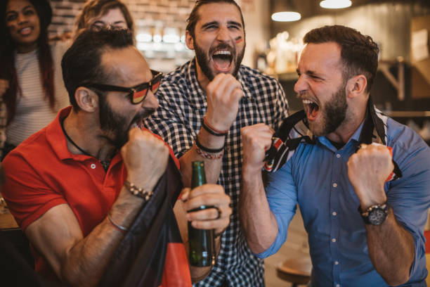 istock Soccer fans cheering 957064630