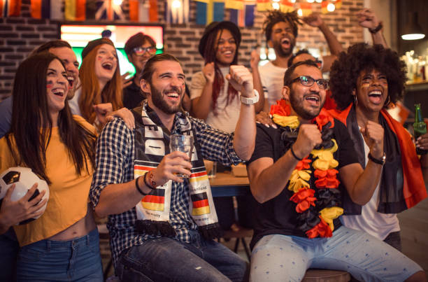 istock Soccer fans cheering 957064760