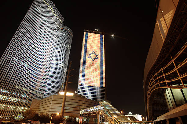 The Azrieli Center in Tel Aviv, Israel illuminated at night stock photo