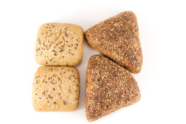 istock bread with cereals and nuts on white background 957072588