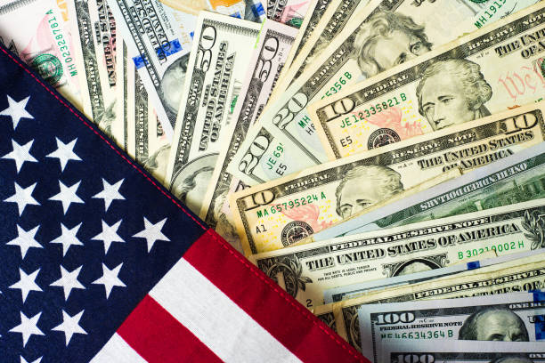 istock American flag and banknotes USD currency 957072746