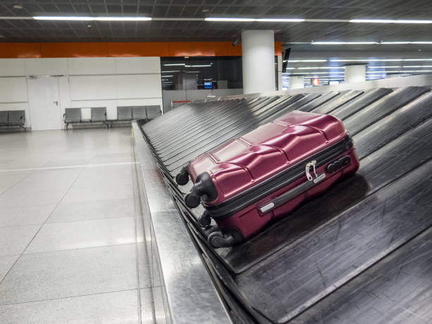 istock Burgundy luggage 957084228