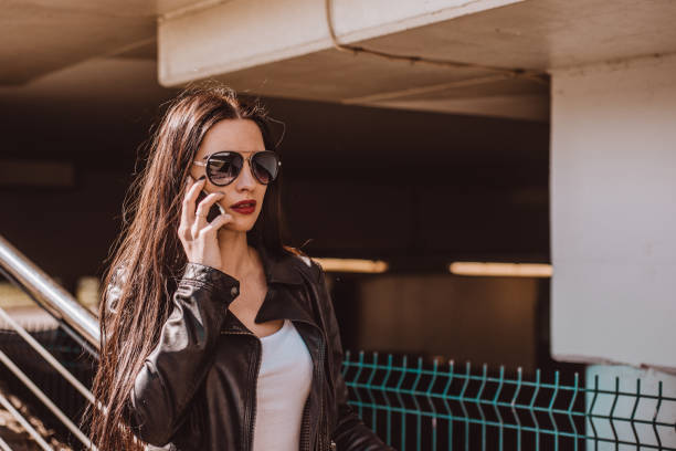 istock Woman talking on the phone. 957089892