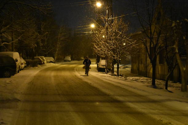 istock Winter road at nigh 957090778