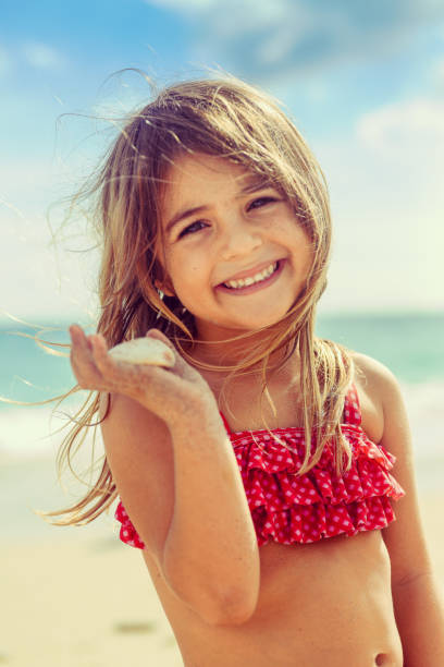 istock Sea shells by the sea shore 957099834