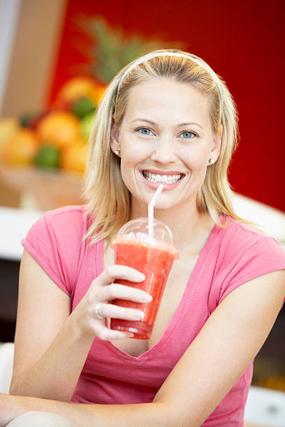 istock Woman Drinking A Berry Smoothie 95710341