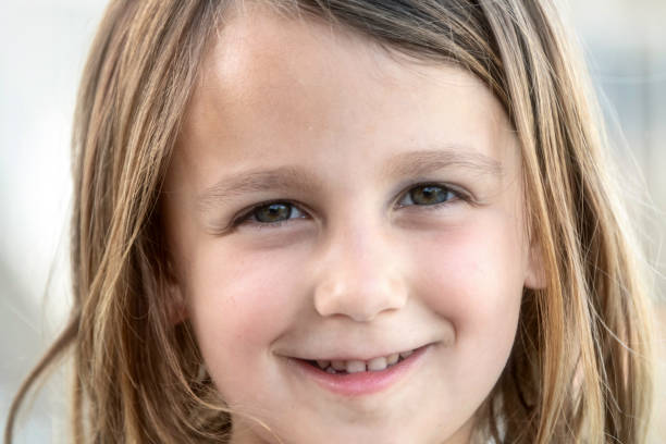 istock little girl smiling 957104102