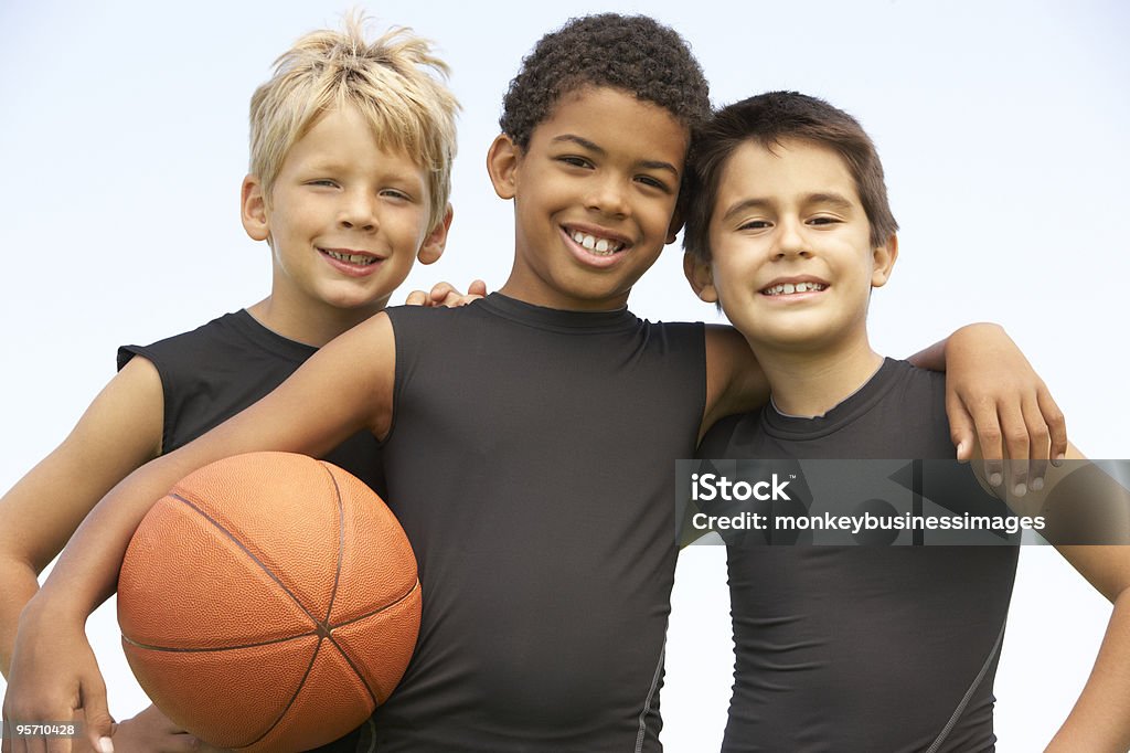 Young Boys Playing Basketball  Basketball - Sport Stock Photo
