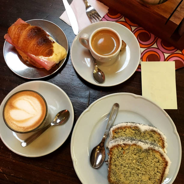 istock Coffee with cake and croissant on the table 957105366