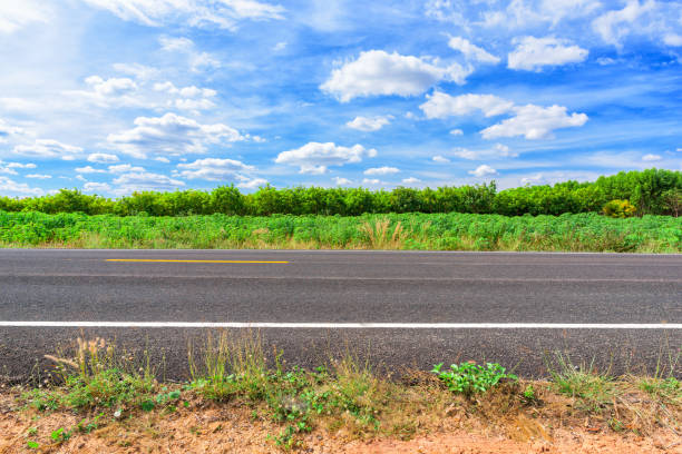 istock Asphalt road side view and landscape countryside. 957111878